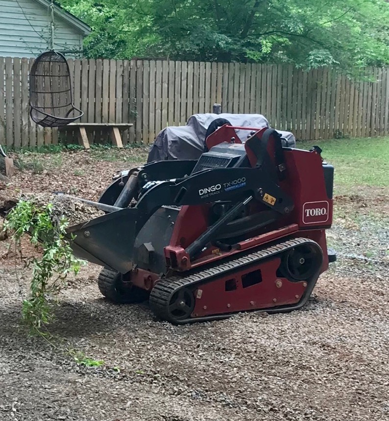 Toro Dingo TX 1000 Wide Track used in contractor equipment cost per hour example